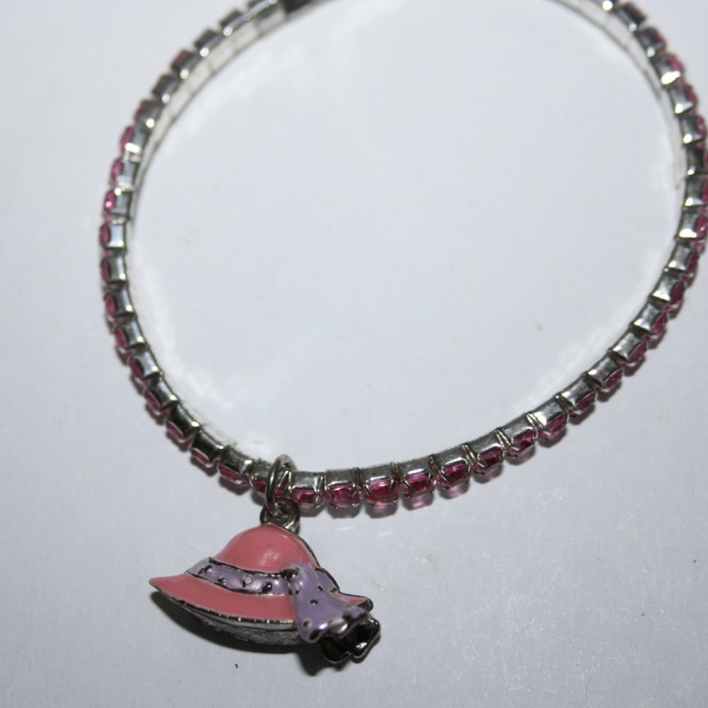 Cute silver and pink rhinestone hat charm bracelet 7"